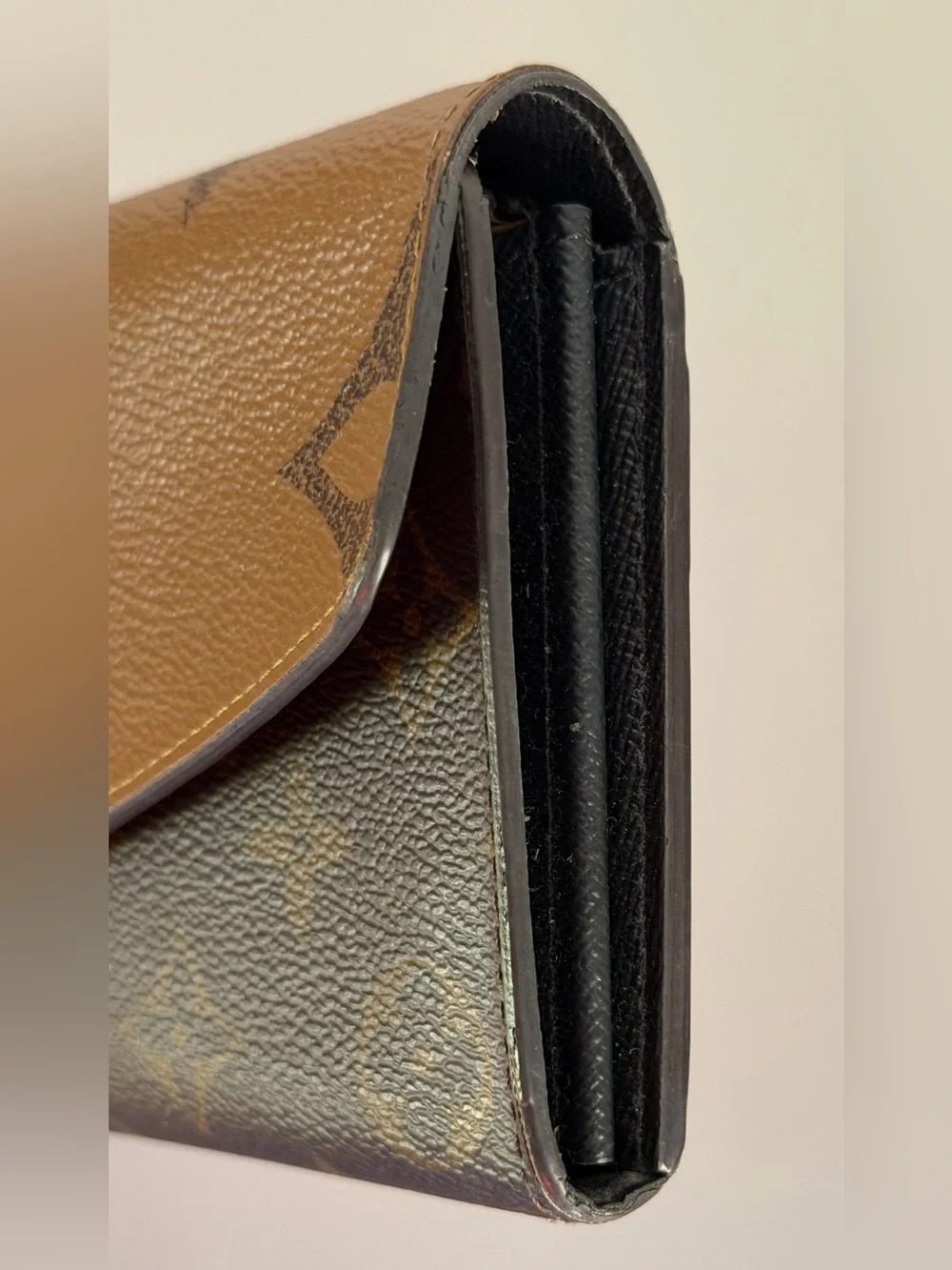 Louis Vuitton Sarah wallet in reverse monogram